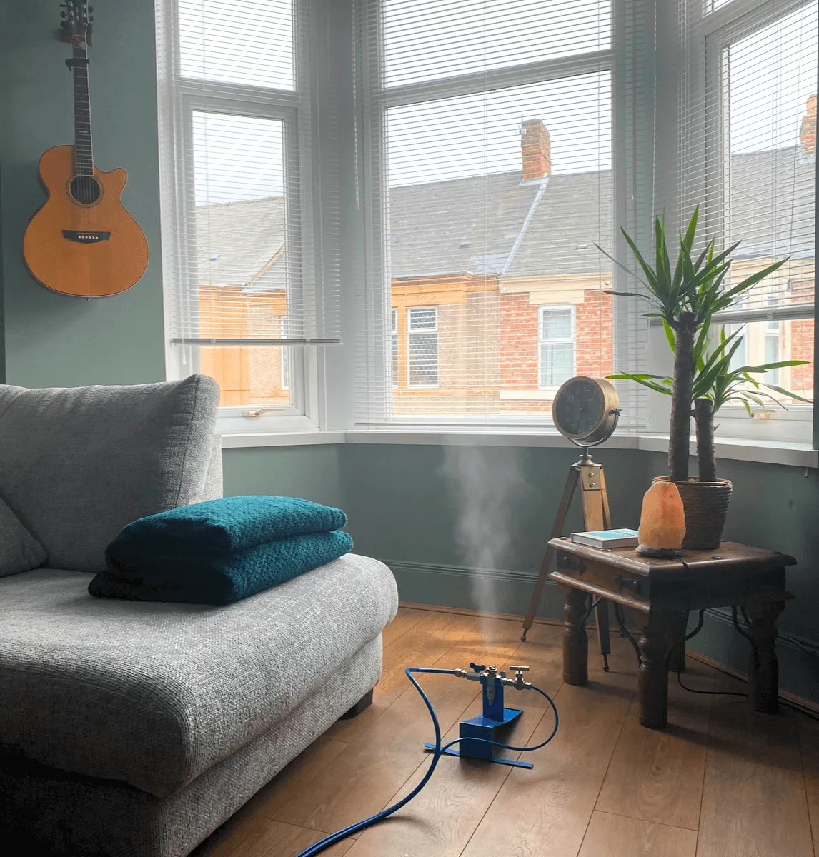 VaPURE&trade; vapor sanitizing a living room