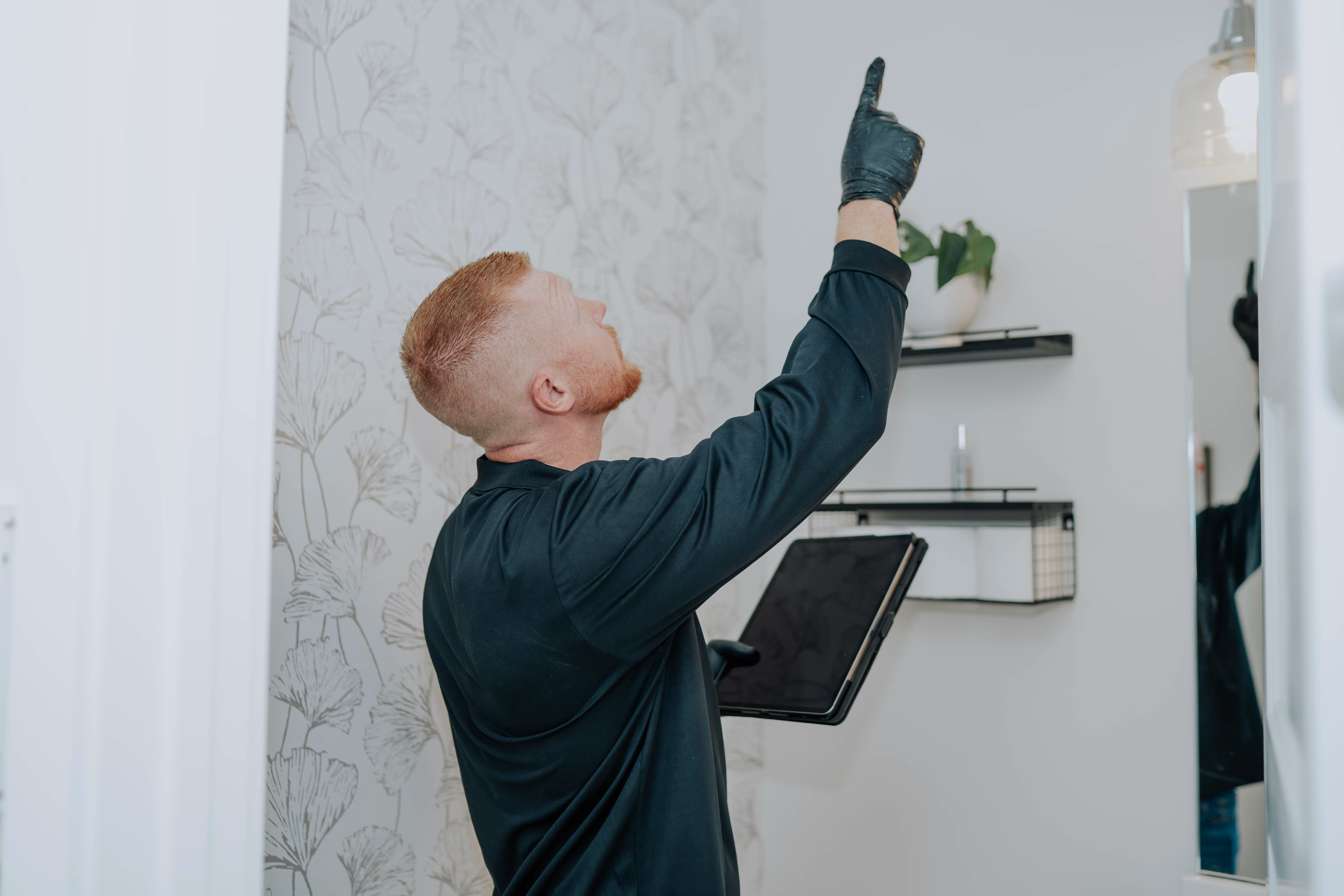 MoldCure specialist inspecting a commercial property