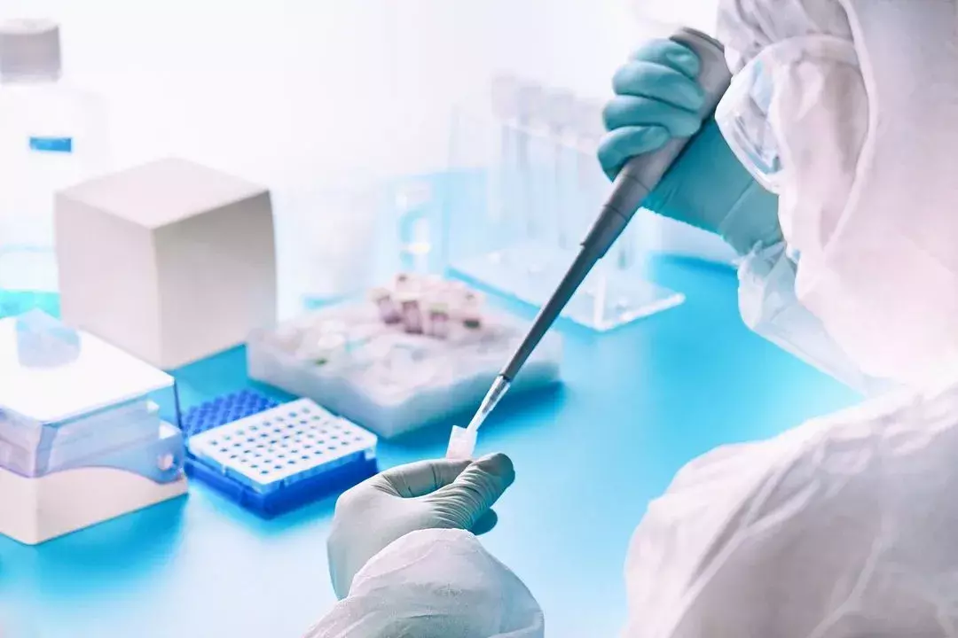 MoldCure technician collecting a surface sample in a rental unit